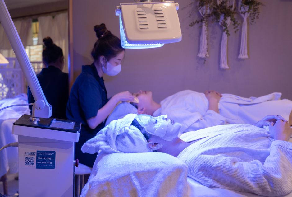 Red LED light therapy face mask during an evening skincare routine